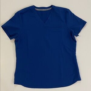 Women’s Fabletics Royal Blue one pocket Scrub top size M